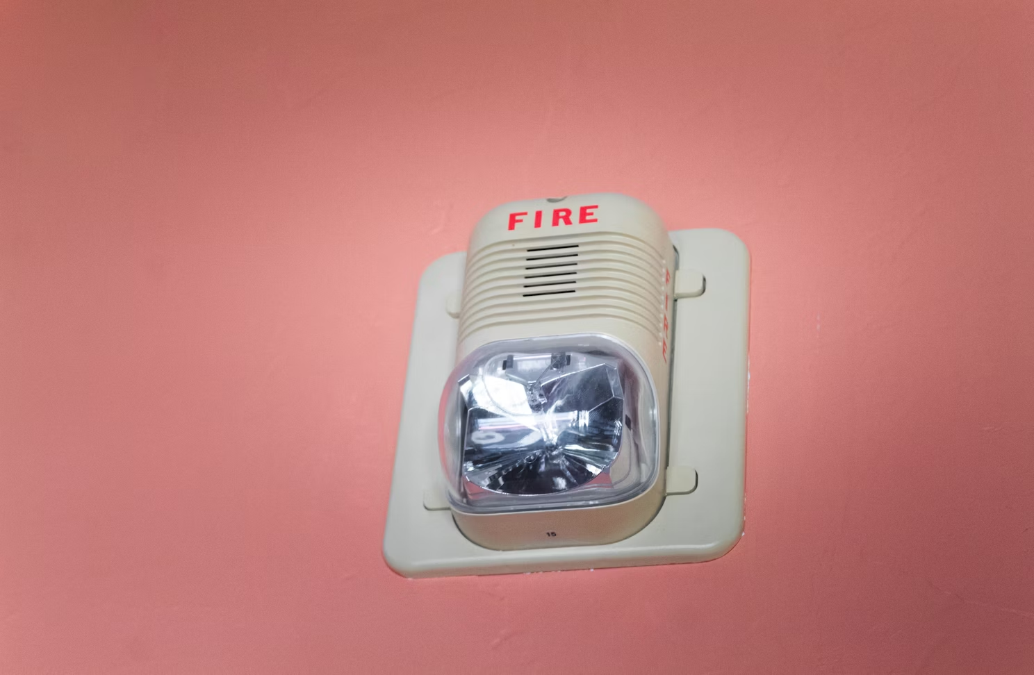 A fire alarm installed on a wall for fire safety in Chicago 