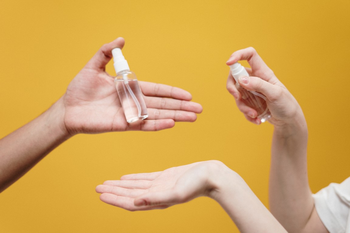 people holding bottle